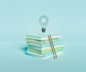 stack-of-books-with-light-bulb-and-ladder-picture-